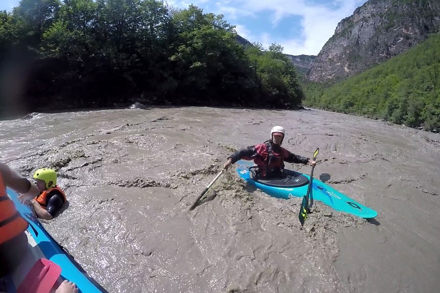 Safaty kayaker during descent by Rioni river. Extrem section